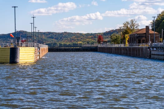 Sailing into the Lock and Dam no. 12 on Upper Mississippi near Hannibal Missouri in the fall