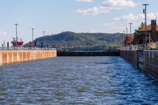 Sailing into the Lock and Dam no. 12 on Upper Mississippi near Hannibal Missouri in the fall