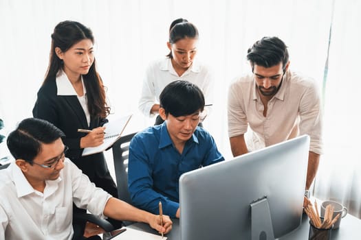 Group of diverse office worker employee working together on strategic business marketing planning in corporate office room. Positive teamwork in business workplace concept. Prudent