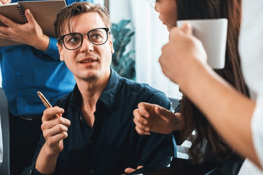 Group of diverse office worker employee working together on strategic business marketing planning in corporate office room. Positive teamwork in business workplace concept. Prudent