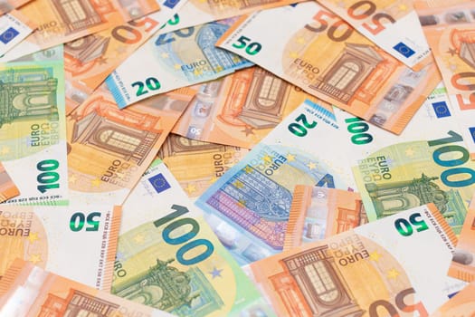 Different Euro Banknotes Money Background. Euro Money Currency. Colored Paper Money. A Lot of Fifty Euro Bills. Business, Finances, Cash and Money Saving Concept