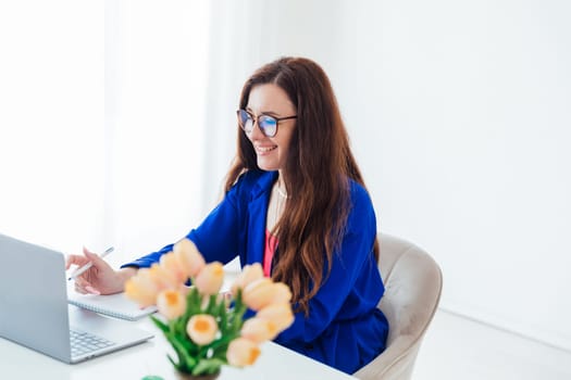 Business woman working online on laptop