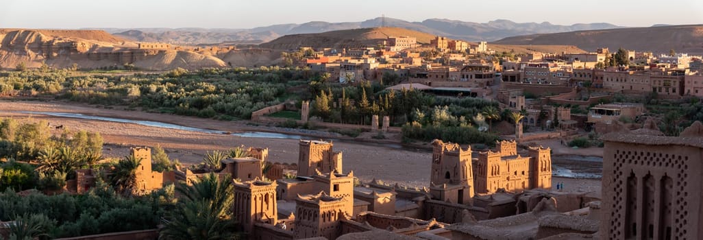 Sunset over the beautiful historic town Ait Ben Haddou in Morocco, famous berber town with many kasbahs built of clay, UNESCO world heritage