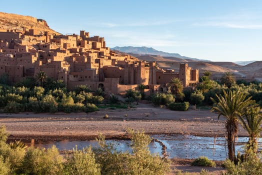 Sunrise over the beautiful historic town Ait Ben Haddou in Morocco, famous berber town with many kasbahs built of clay, UNESCO world heritage