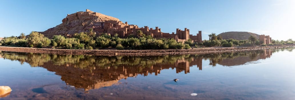 Sunrise over the beautiful historic town Ait Ben Haddou in Morocco, famous berber town with many kasbahs built of clay, UNESCO world heritage