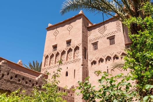 Traditional ornate facade of a Moroccan Kasbah at the famous Road of the Kasbahs