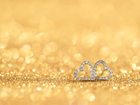 diamond hearts on gold bokeh background love concept