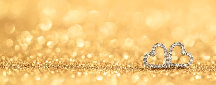 diamond hearts on gold bokeh background love concept