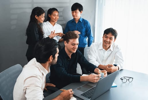 Group of diverse office worker employee working together on strategic business marketing planning in corporate office room. Positive teamwork in business workplace concept. Prudent