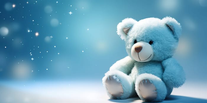 Cute, plush teddy bear on a light blue background with copy space