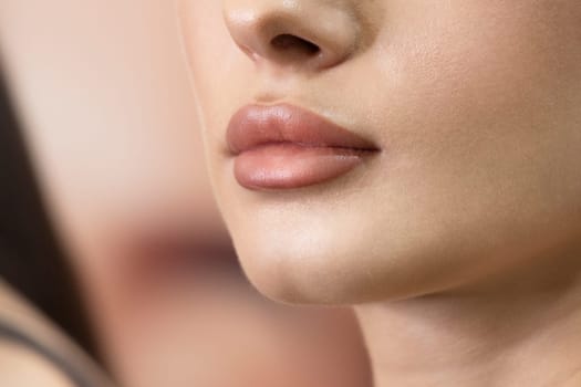 inflated lips of a beautiful girl, change in appearance