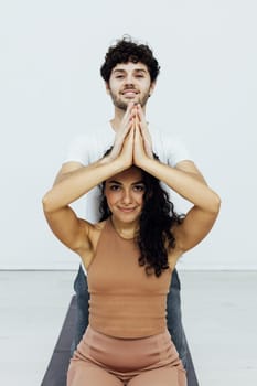 a healthy back asana exercises woman and man practice yoga lotus pose stretching
