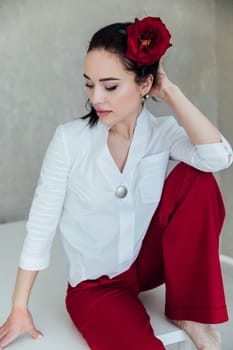 brunette woman in white red clothes