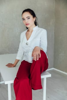 brunette woman in white red clothes
