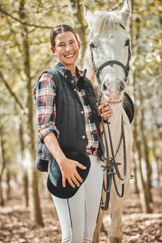 Portrait of happy woman with horse standing in woods, nature and love for animals, pets or dressage with trees. Equestrian sport, jockey or rider in forest for adventure, pride and smile on face