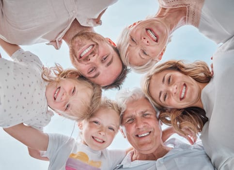 Happy family, portrait and huddle for bonding together, parents and kids with pov, blue sky and outdoor. Holiday, carefree and grandparents with smile, childhood memories and cheerful for vacation.