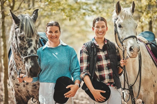 Smile, nature and portrait of women with horses in forest training for race, competition or event. Happy, animal and young female people with stallion pets outdoor in woods for equestrian practice
