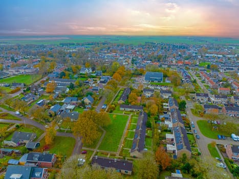 Aerial from the village Koudum in Friesland the Netherlands at sunset