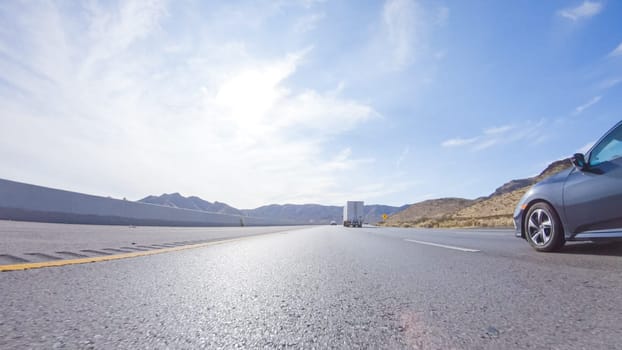 HWY 15, California, USA-December 3, 2022-Embarking on a road trip from Nevada to California, driving on Highway 15 during the day offers scenic views and an exciting journey between states.