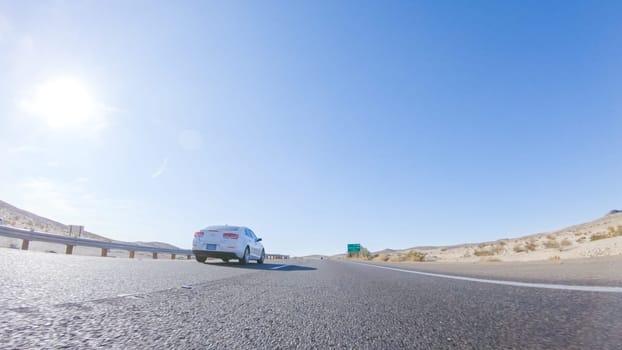 HWY 15, California, USA-December 3, 2022-Embarking on a road trip from Nevada to California, driving on Highway 15 during the day offers scenic views and an exciting journey between states.