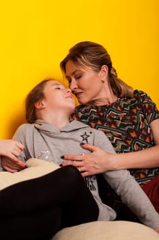 Mom and daughter hugging family together