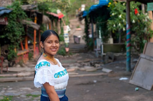 smile day. smiling and happy young woman in her jungle village in latin america. High quality photo
