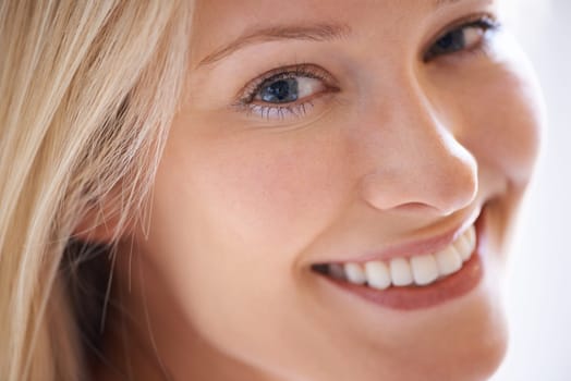 Closeup, happy woman and smile for skincare with portrait in home for dermatology, texture or pigmentation. Female person, hair and face for results of beauty, treatment or hydration for anti aging.