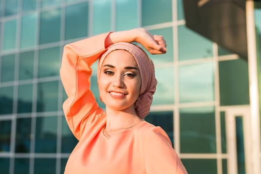 girl in hijab. Portrait of a smiling beautiful muslim woman