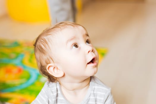 Portrait of cute newborn baby boy indoors