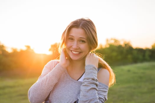 beautiful portrait of a carefree friendly approachable girl with a stunning smile and cute looks