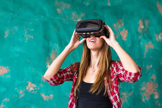 Woman in virtual reality headset enjoying her experience.