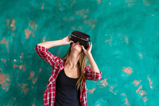 Woman in virtual reality headset enjoying her experience.