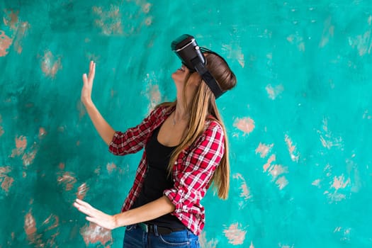 Woman in virtual reality headset enjoying her experience.