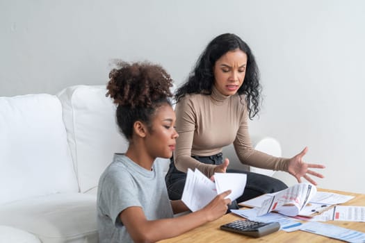 Stressed African American women has financial problems with credit card debt to pay crucial show concept of bad personal money and mortgage pay management crisis.