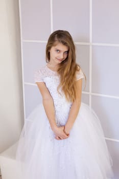 Portrait of girl in a white dress