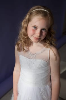 Portrait of girl in a white dress