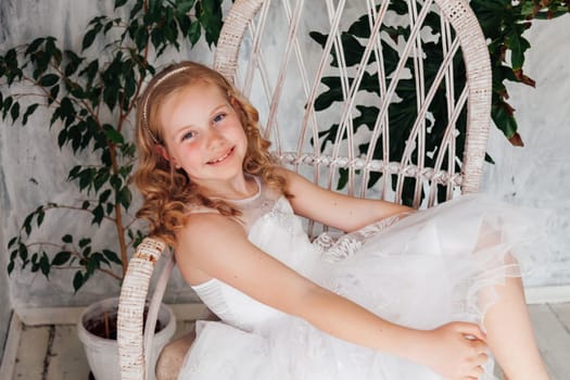 Portrait of a girl in a white dress