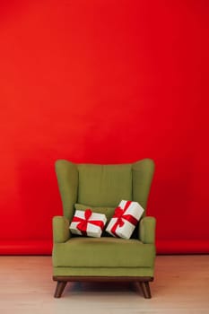 red black background green chair with gifts