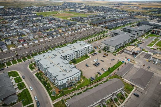 Stunning bird's-eye perspective of the Evergreen neighborhood in Saskatoon, showcasing the unique urban layout and the natural beauty of Saskatchewan's landscapes.