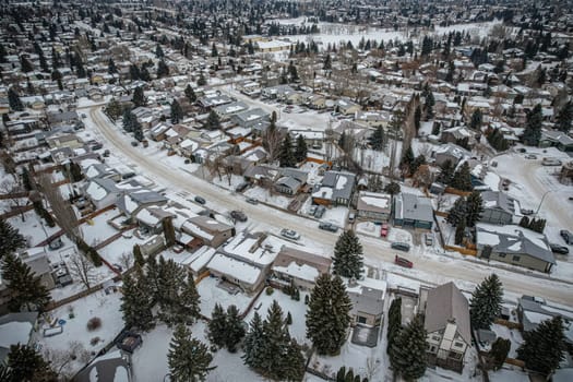Soaring over Lakeview in Saskatoon, this bird's-eye capture magnifies the neighborhood's tranquil waters, verdant parks, and the serene rhythm of Saskatchewan living