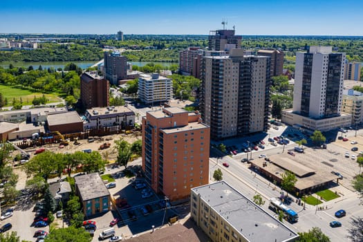Discover the vibrant City Park neighborhood in Saskatoon from above. This drone image captures its lush green spaces, historic charm, and lively urban atmosphere, offering a unique aerial perspective.