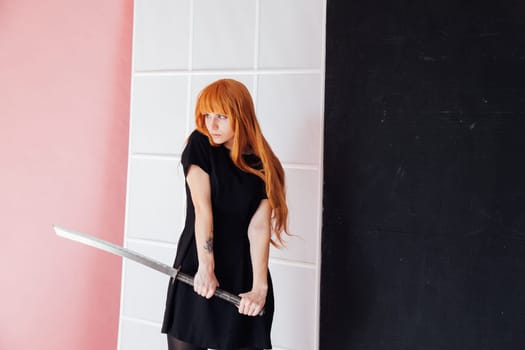 cosplayer with red hair holds Japanese sword