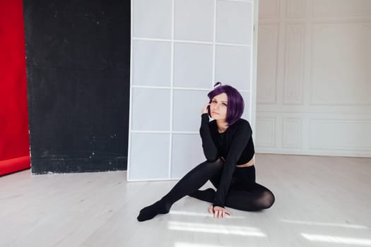 portrait of a woman anime cosplayer with purple hair
