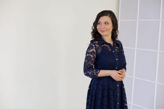 Portrait of a beautiful Asian woman in a blue dress