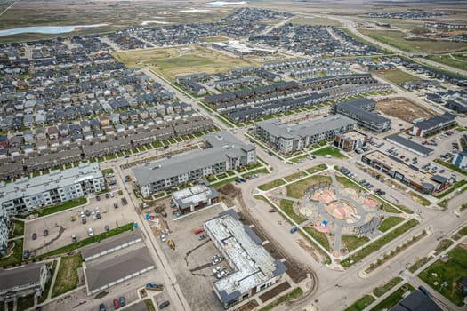 Stunning bird's-eye perspective of the Evergreen neighborhood in Saskatoon, showcasing the unique urban layout and the natural beauty of Saskatchewan's landscapes.
