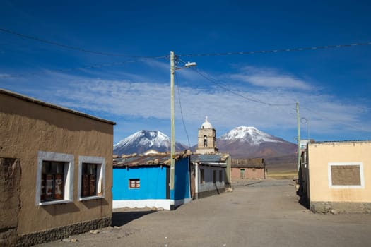 Sajama, Bolivia - October 27, 2015: Town square with the church in the background.