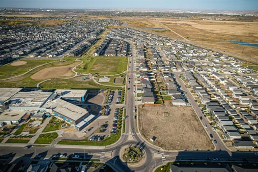 Stunning bird's-eye perspective of the Evergreen neighborhood in Saskatoon, showcasing the unique urban layout and the natural beauty of Saskatchewan's landscapes.