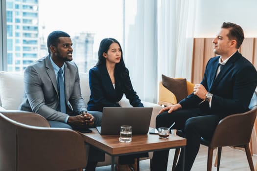 Group of diverse executive investor listening businessman talking about investment. Professional business team discussing about business plan, statistic, marketing strategy at office. Ornamented.