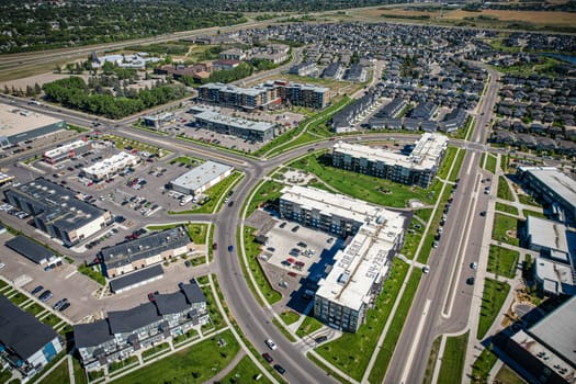 Captivating aerial shot of Stonebridge in Saskatoon, highlighting the harmonious blend of modern architecture and Saskatchewan's verdant surroundings.
