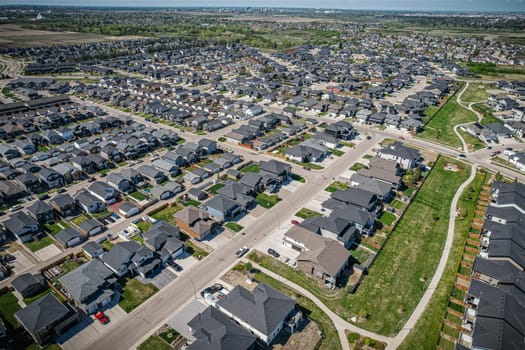 Stunning bird's-eye perspective of the Evergreen neighborhood in Saskatoon, showcasing the unique urban layout and the natural beauty of Saskatchewan's landscapes.